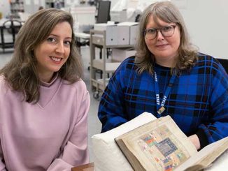 Fellow-Dr-Sofi-Basseghi-and-Senior-Librarian-Dr-Anna-Welch-with-a-rare-Persian-manuscripts-courtesy-of-State-Library-Victoria