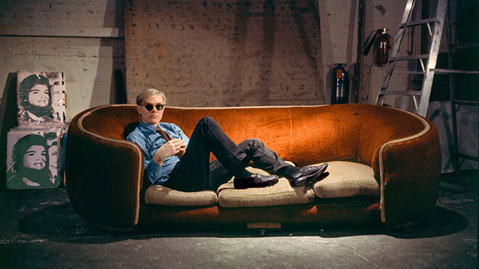 Bob-Adelman-Andy-Warhol-on-the-red-couch-at-the-Factory-1964