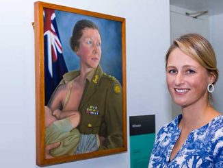 Winner-of-the-2022-Napier-Waller-Art-Prize-Anneke-Jamieson-with-her-work-The-Promotion