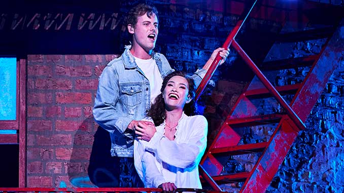 OA Billy Bourchier as Tony and Nina Korbe as Maria in West Side Story on Sydney Harbour photo by Keith Saunders.jpg