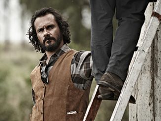 Aaron Pedersen as Cam Delray in Jack Irish