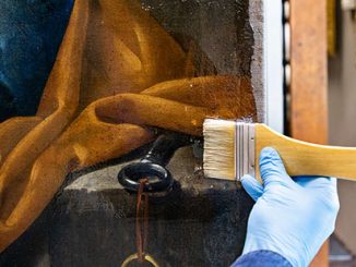 CSIRO Brush application of conservation grade resin onto a painting - photo by Selina Ou and Narelle Wilson NGV