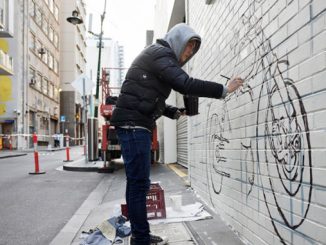 Shawn-Lu-working-on-his-artwork-in-Langs-Lane-photo-by-Nicole-Reed