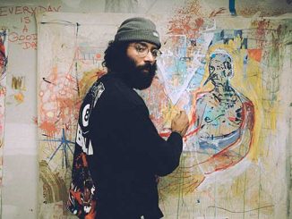 Man-in-black-sweater-standing-beside-wall-with-graffiti-photo-by-Frankie-Cordoba-on-Unsplash 