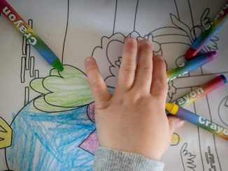 Student colouring a picture sven brandsma unsplash