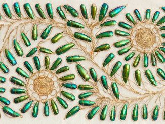 Textile-length-decorated-with-beetle-wings-India-Powerhouse-collection-acquired-1883-photo-by-Zan-Wimberley