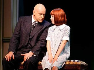 Anthony Warlow as Daddy Warbucks and Lucille Le Meledo as Annie in the 2012 production of ANNIE - photo by Jeff Busby