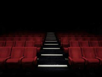 Seats in a cinema photo by Felix Mooneeram on Unsplash