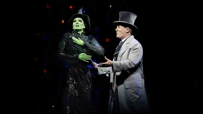 Sheridan Adams as Elphaba and Todd McKenney as the Wizard in WICKED photo by Jeff Busby