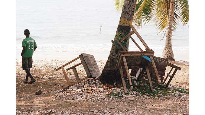 AGWA Henry Roy Man walking Jacmel Haiti 2016