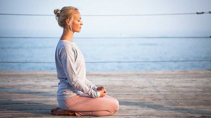 Woman relaxing near the beach photo by Srresume from Pixabay