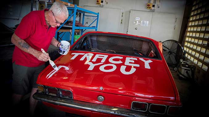 MAGNT John Garner painting the replica Torana 50 years later 2024 photo by Georgina Campbell