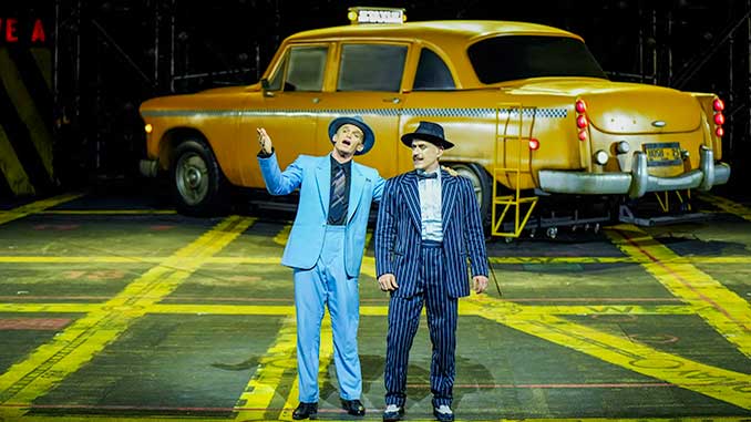 Cody Simpson as Sky Masterson and Bobby Fox as Nathan Detroit in the Handa Opera on Sydney Harbour's 2025 production of Guys and Dolls photo by Neil Bennett