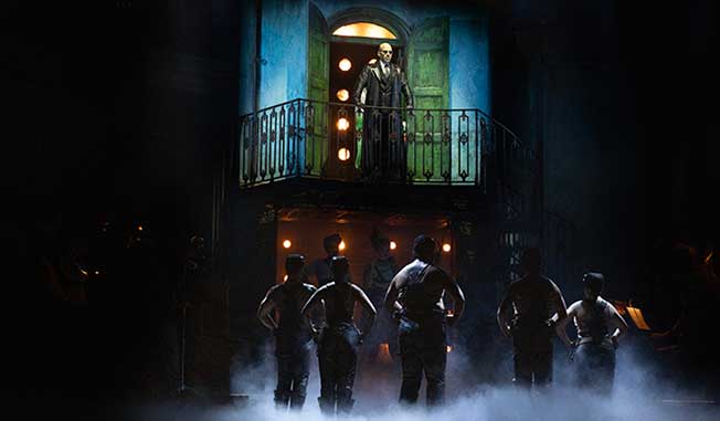 Adrian Tamburini as Hades and the Cast of Hadestown photo by Lisa Tomasetti