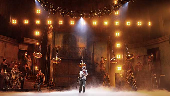 Noah Mullins as Orpheus and the Cast of Hadestown photo by Lisa Tomasetti